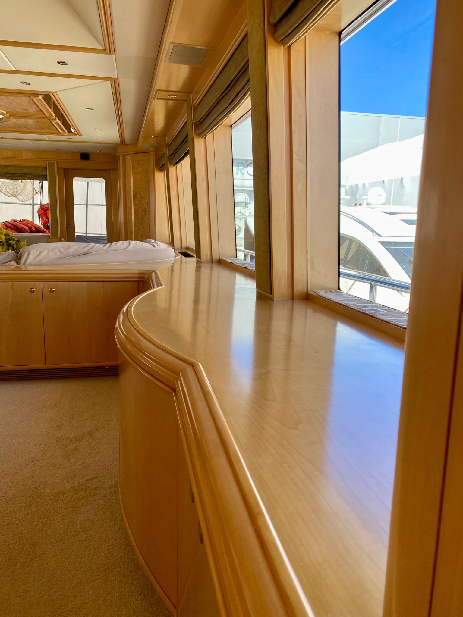 Restored and refinished timber cabinetry inside a motor yacht